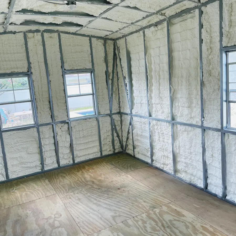 Closed-cell spray foam insulation applied to wall cavities in a residential project in Huntertown